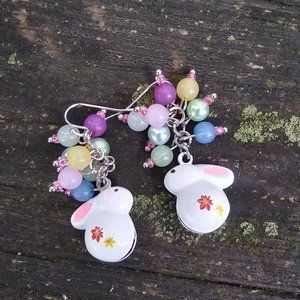 Vintage Easter bunny rattle with pastel multi colored beads above it earrings